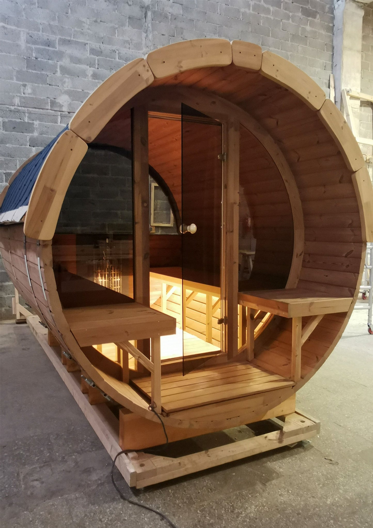 Glass Facade & Half Moon Window Barrel Sauna