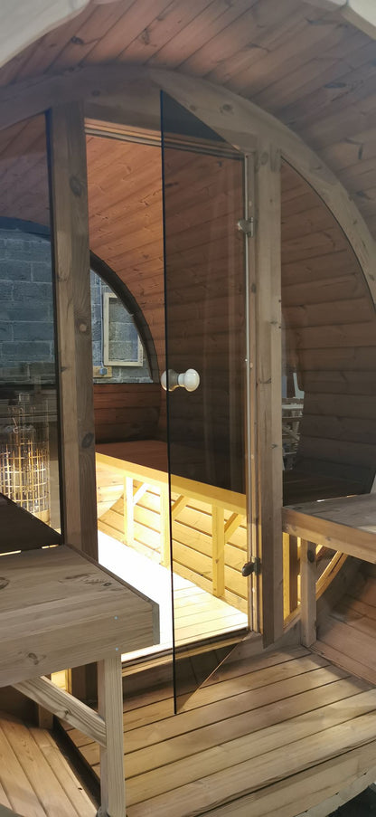 Glass Facade & Half Moon Window Barrel Sauna